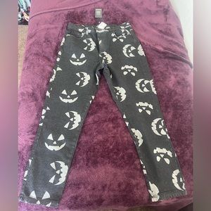 NWT Hell Bunny Jeans Jack o lantern faces. Size medium never worn! Halloween